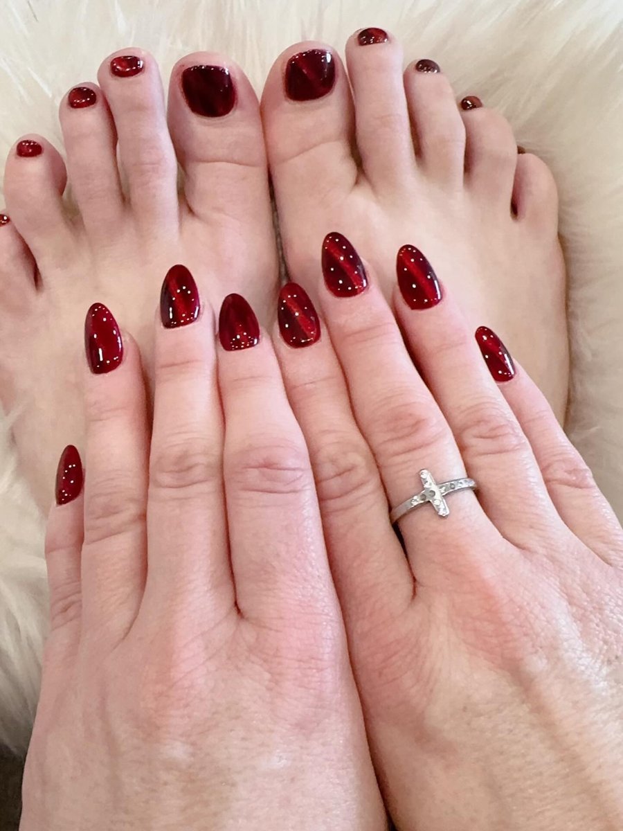 Red glitter pedicure with matching manicure