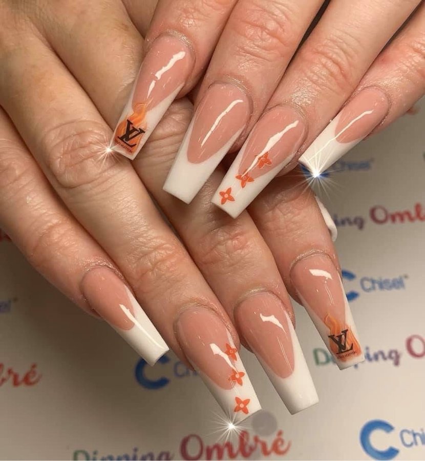 White French ombré nails with designer-inspired art